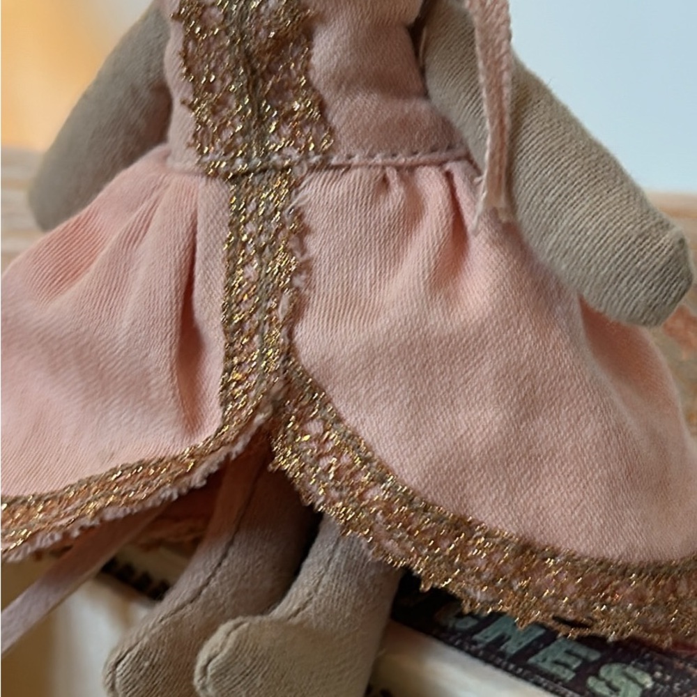 Adorable Pink Plush Doll with Gold Accents